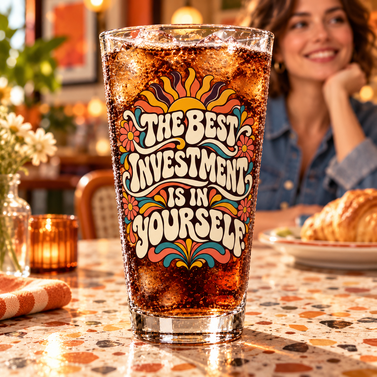 The Best Investment Is In Yourself. Pint Glass — Retro & Psychedelic — lifestyle with a tapered pint glass